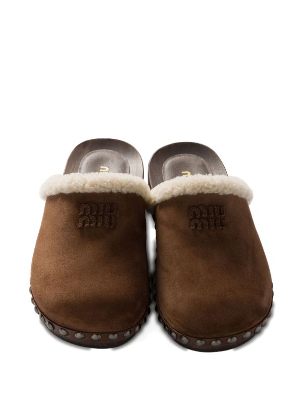 Miu Miu shearling-lined suede clogs in brown