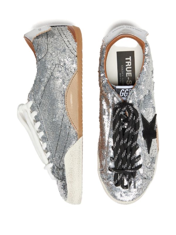 True-Star in silver sequins with black star and silver