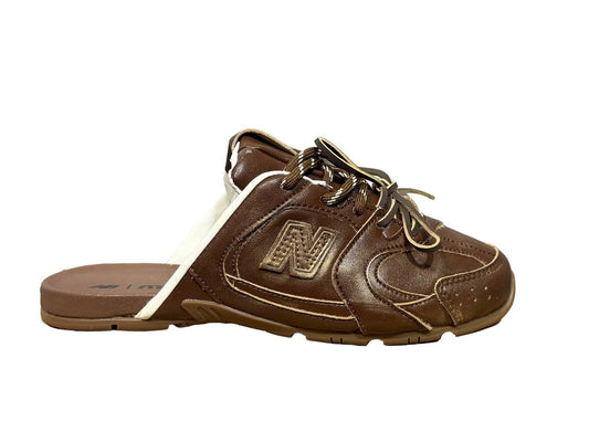 New Balance 530 SL Mule
Miu Miu brown leather